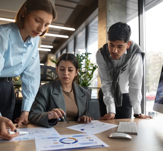 people-analyzing-checking-finance-graphs-office