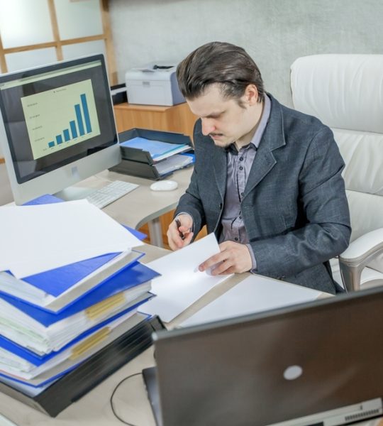 young-businessman-working-from-his-office-concept-hard-work